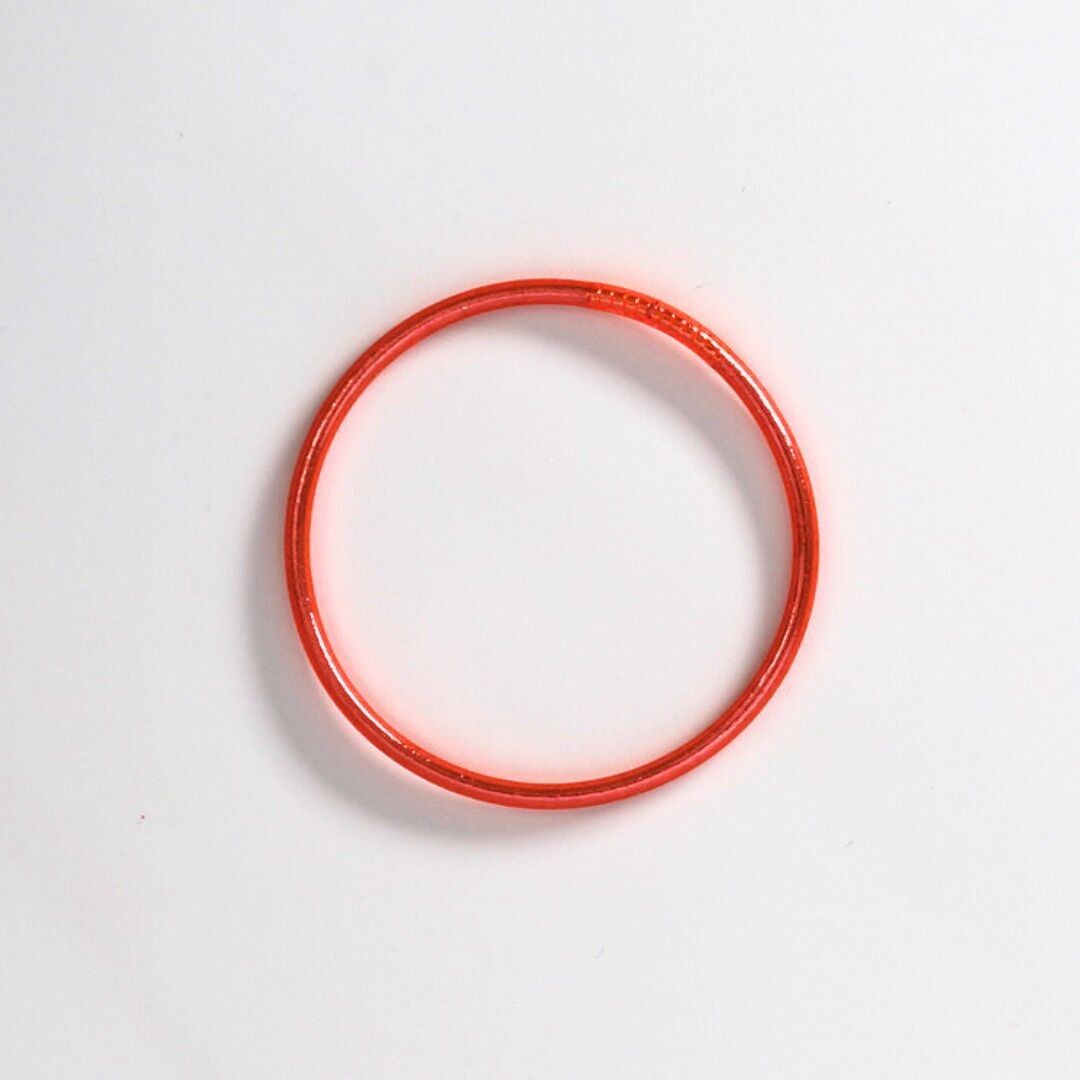 Fine coral Buddhist bangle