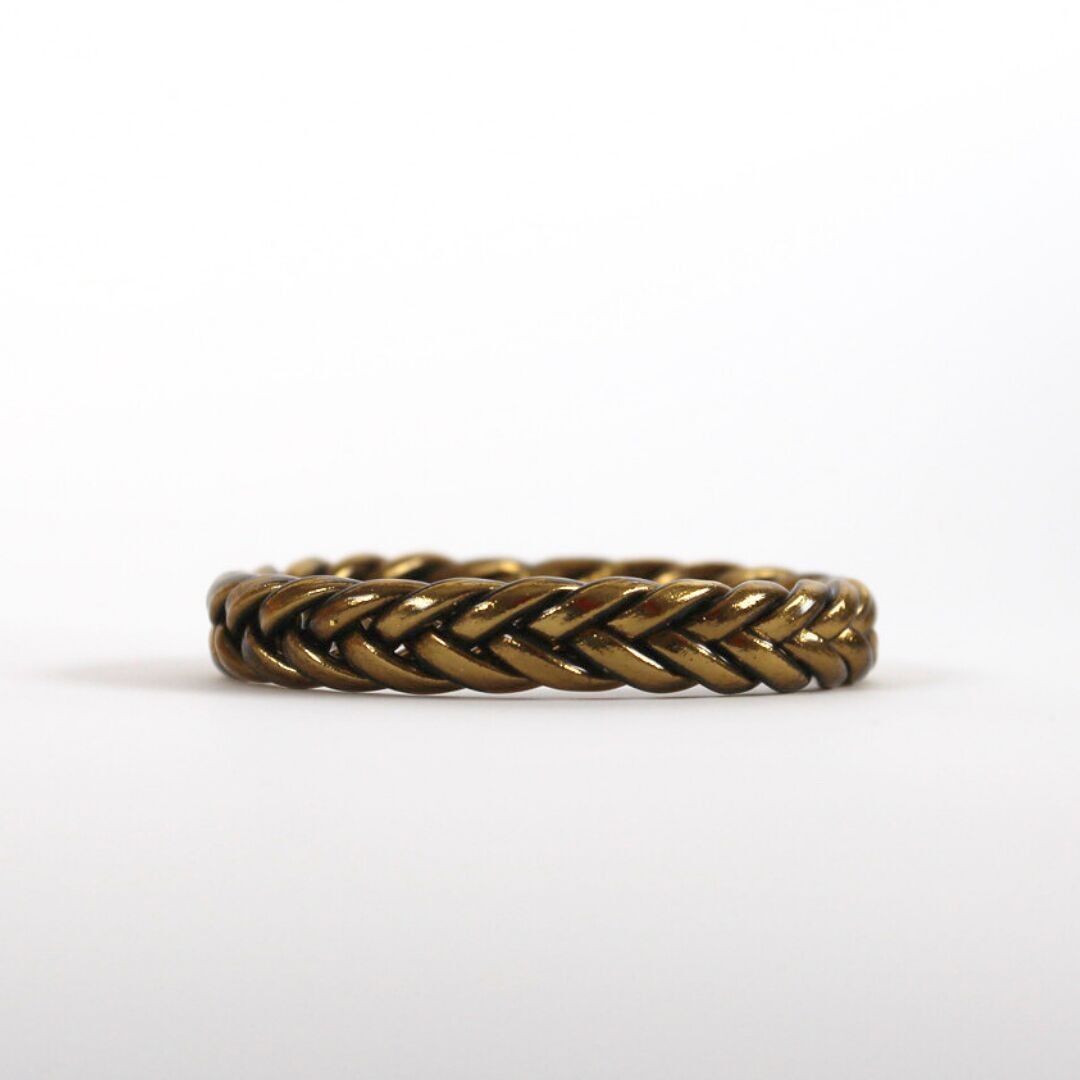 Bracciale buddista intrecciato in oro antico