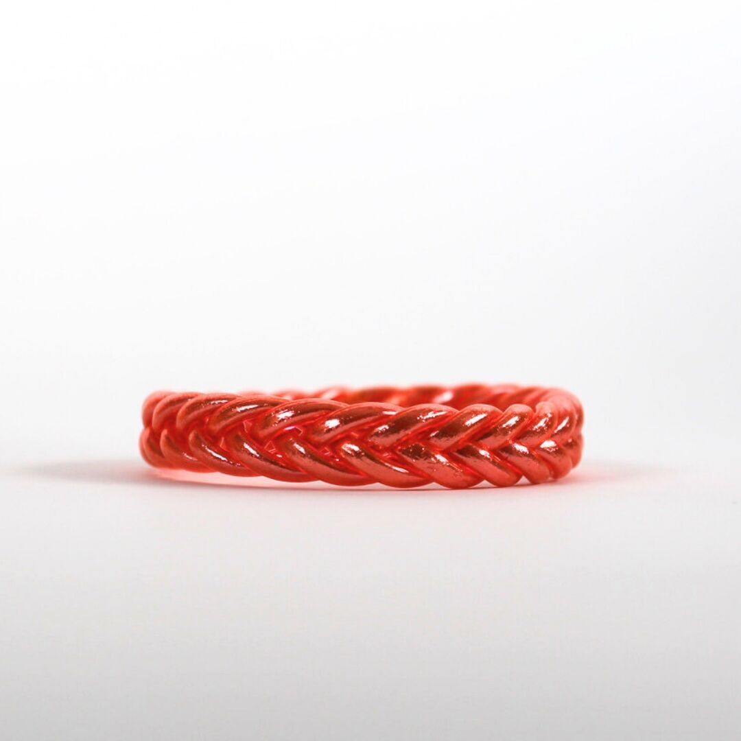 Bracciale buddista intrecciato in corallo