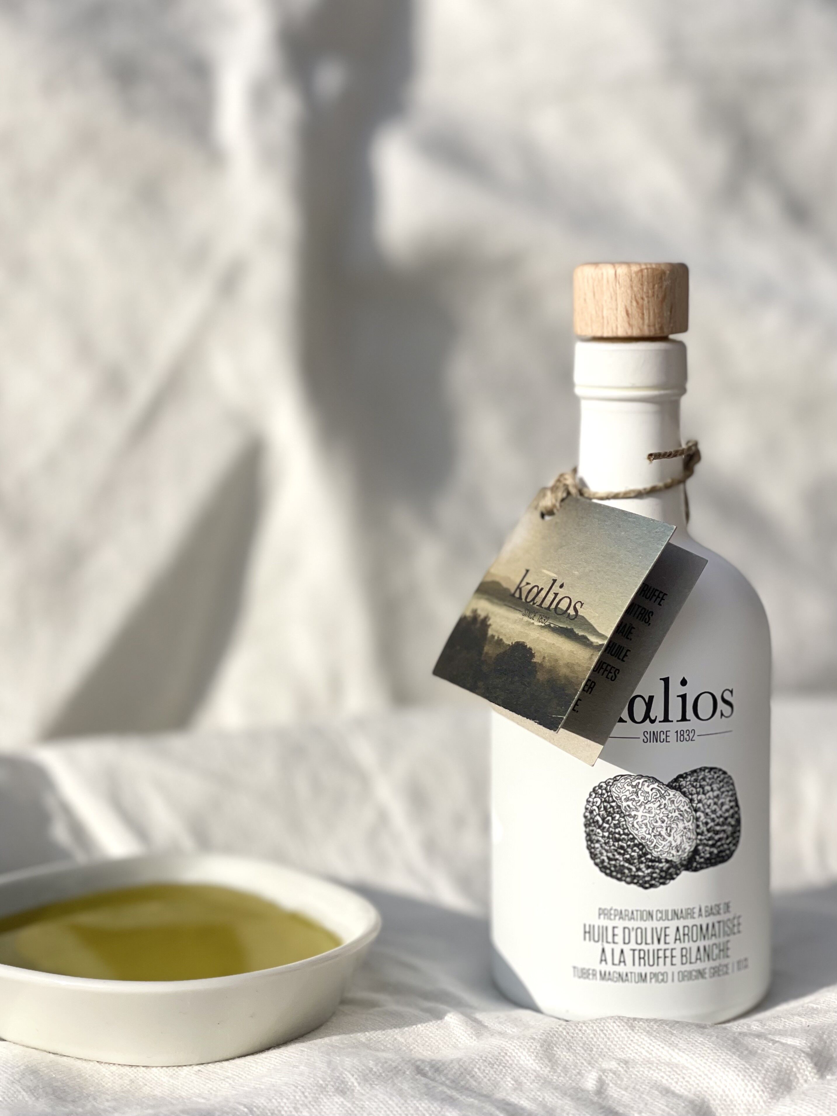 Preparazione culinaria a base di olio d'oliva aromatizzato al tartufo bianco