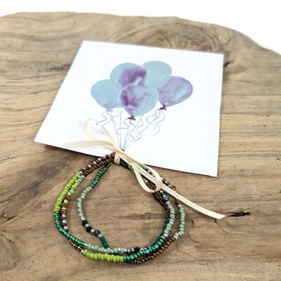 Tarjeta con forma de pulsera con globo de menta