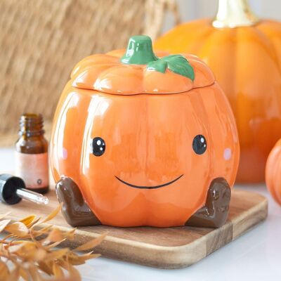 Quemador de aceite y calentador de cera con forma de calabaza sonriente