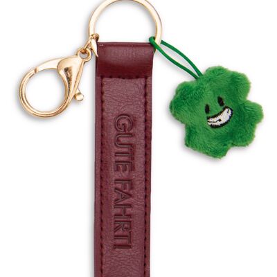 Llavero "¡Buen viaje!"Correa de cuero artificial roja 10cm m. Hoja de trébol en tarjeta de encabezado