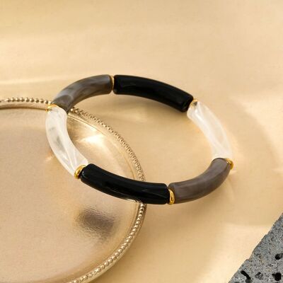 Pulsera elástica de acrílico negro con brillo en contraste