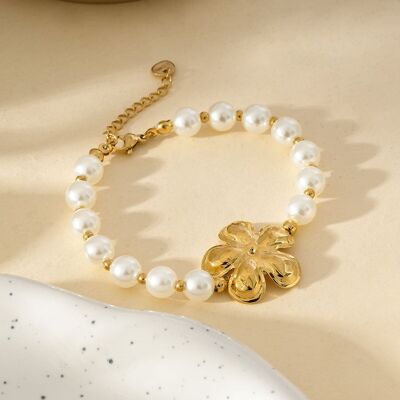 Pulsera de Perlas Blancas con Flor Dorada