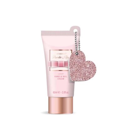 Crema de manos en polvo rosa en tubo con purpurina lima