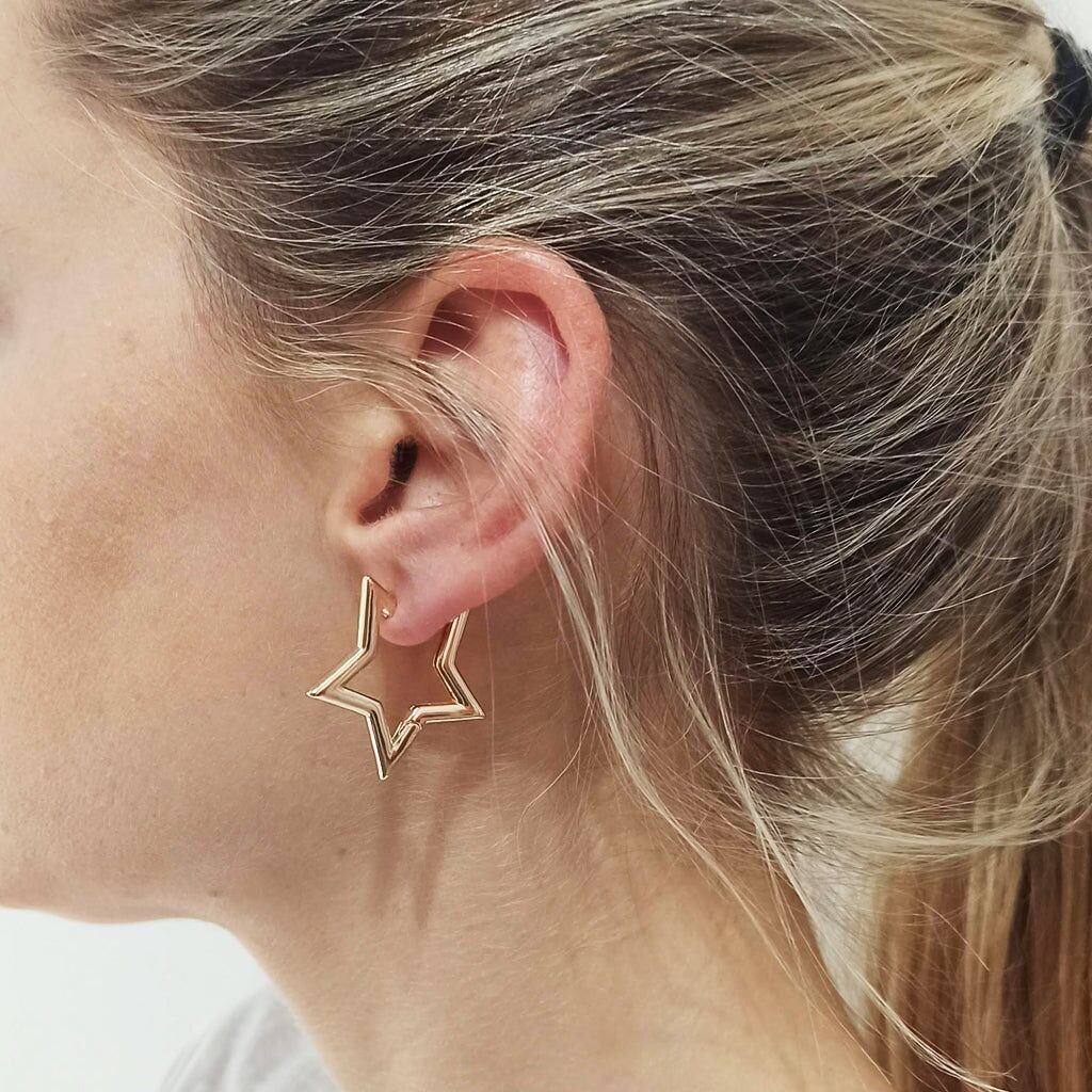 Orecchini dorati in stile rocker · Stella