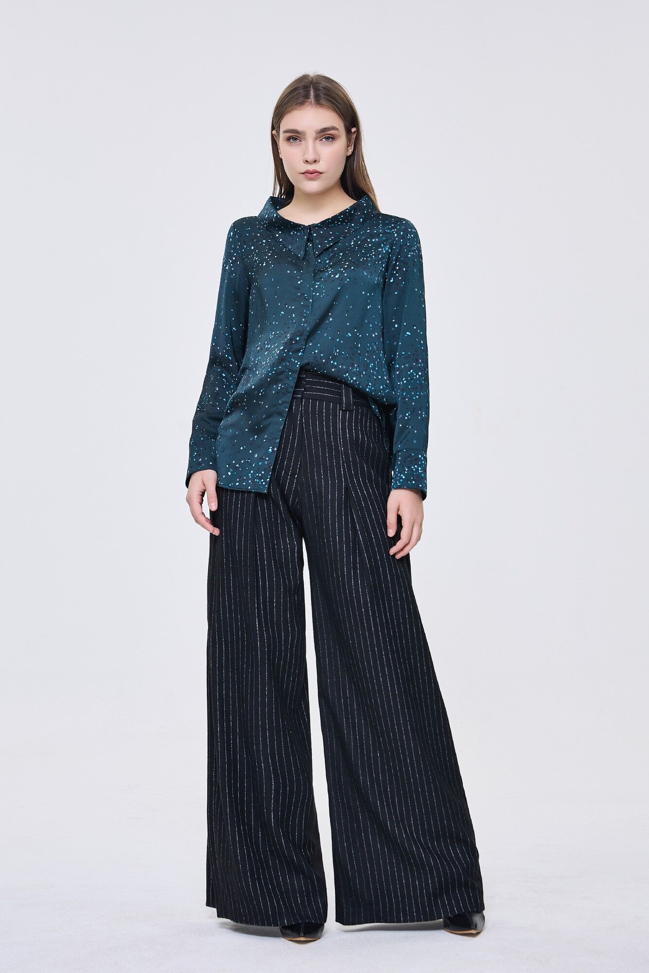 Camicia verde con motivo floreale