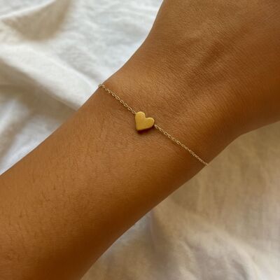 Pulsera de acero inoxidable con corazón dorado