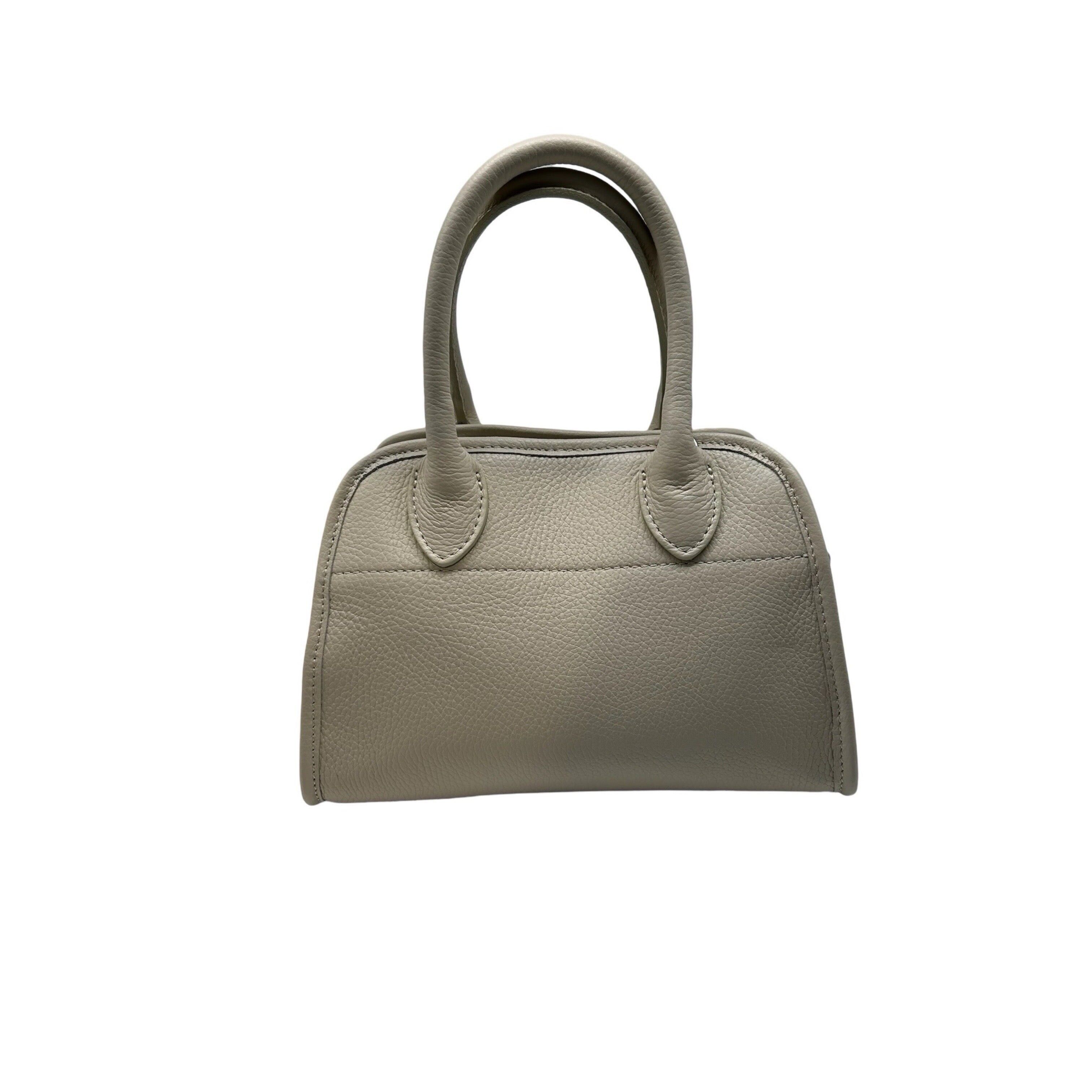 MINI BORSA A MANO IN PELLE DI VACCHETTA BENINE