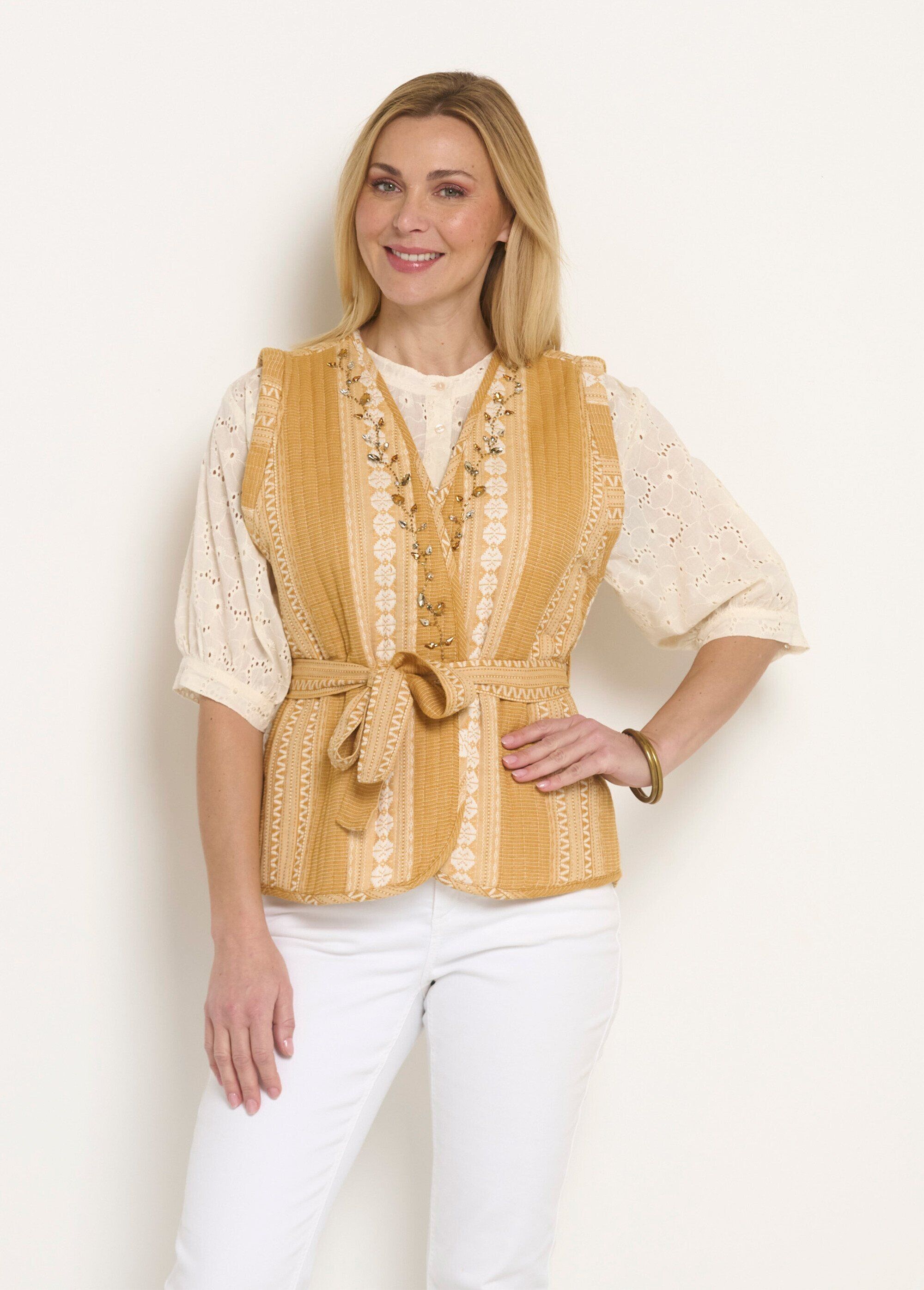 Chaqueta acolchada sin mangas con detalles de pedrería