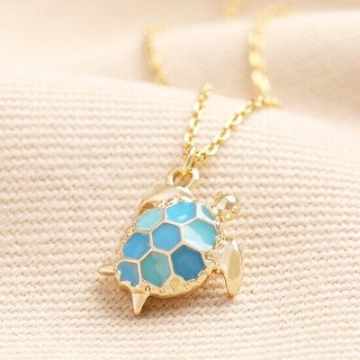 Collar de tortuga azul y dorada