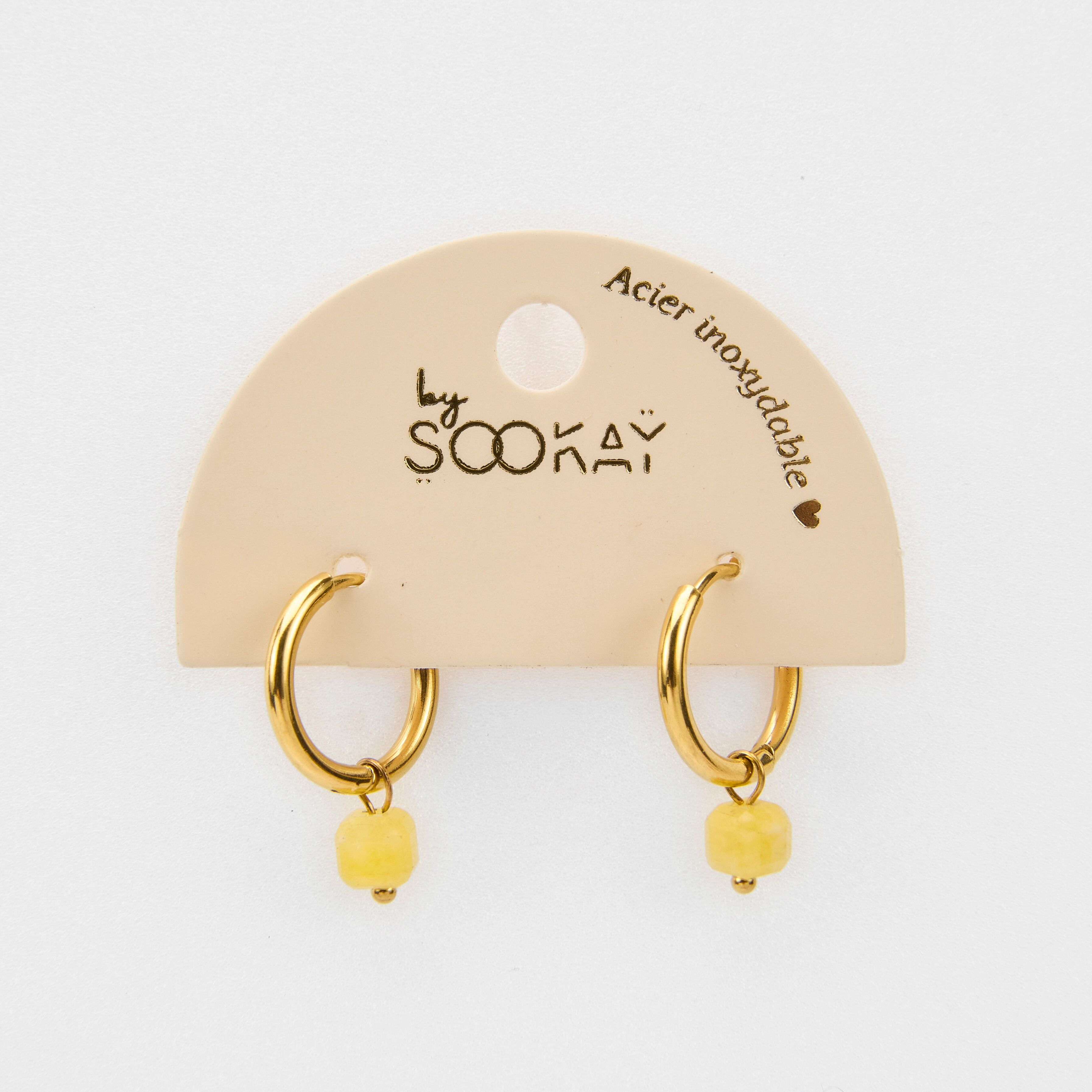 orecchini in acciaio con pietra cubica gialla