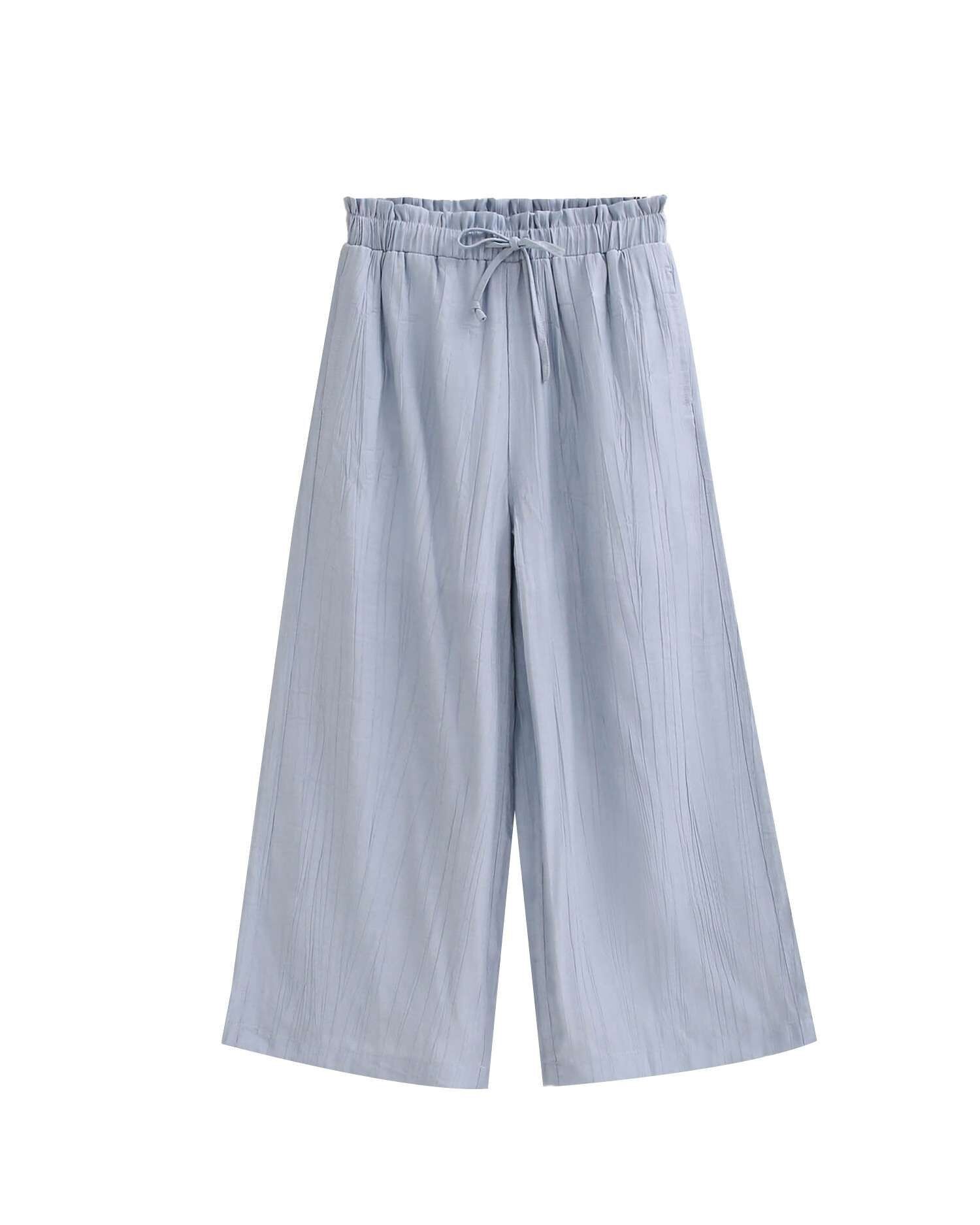 Pantaloni da bambina fluidi blu pastello M10-21501155