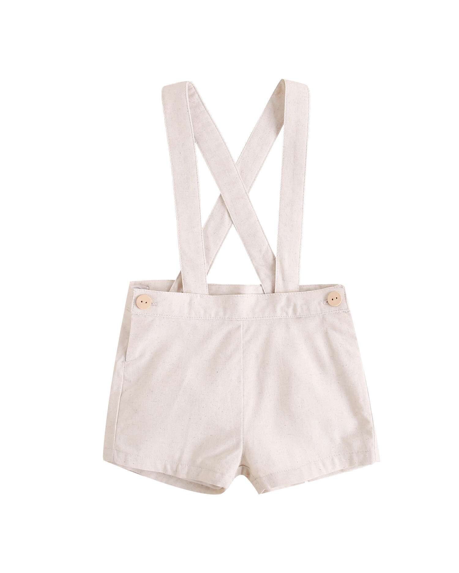 Pantaloncini neonato marrone chiaro con spalline incrociate M180-29514134