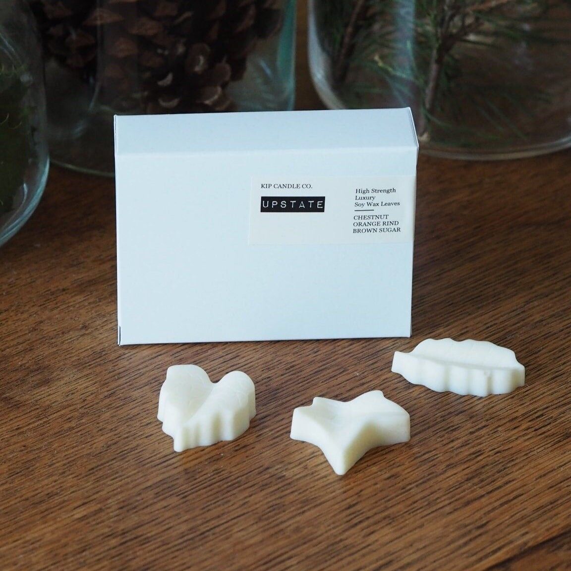 Hojas de cera derretidas Upstate: castañas, cáscara de naranja y azúcar morena