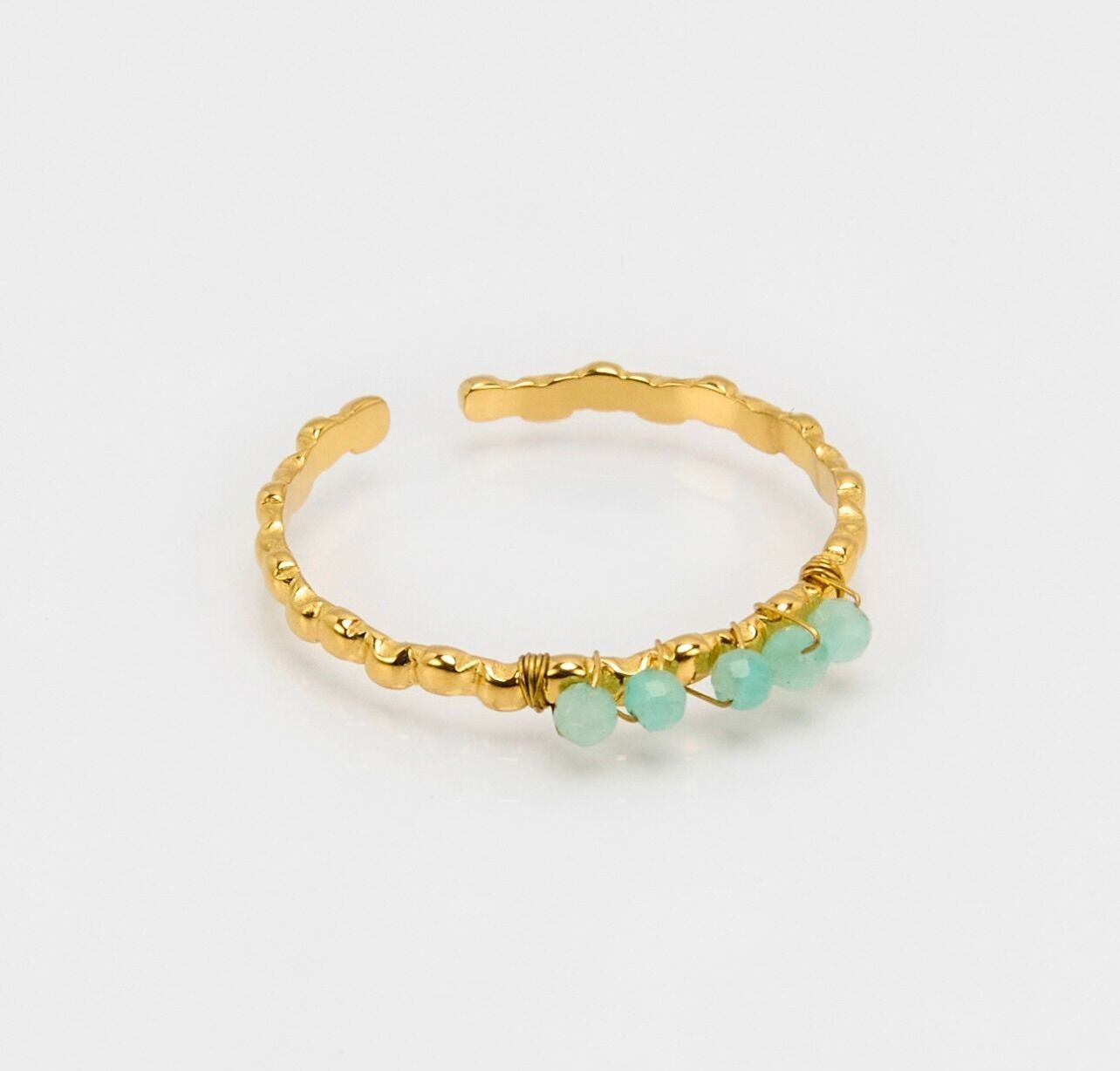 Anello in acciaio inossidabile con pietre color turchese