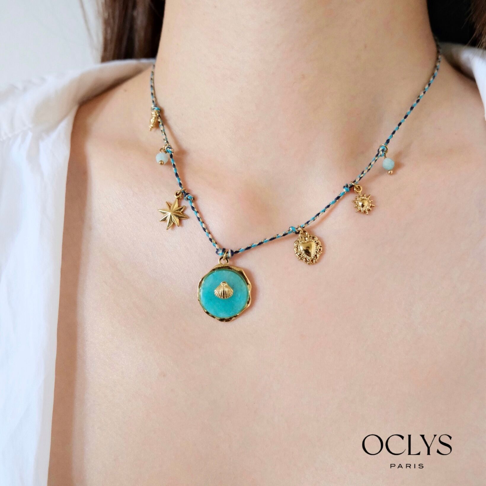 Collar de cordón de colores con dijes de acero inoxidable con temática oceánica de Tina