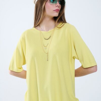 Suéter amarillo extragrande con mangas hasta el codo