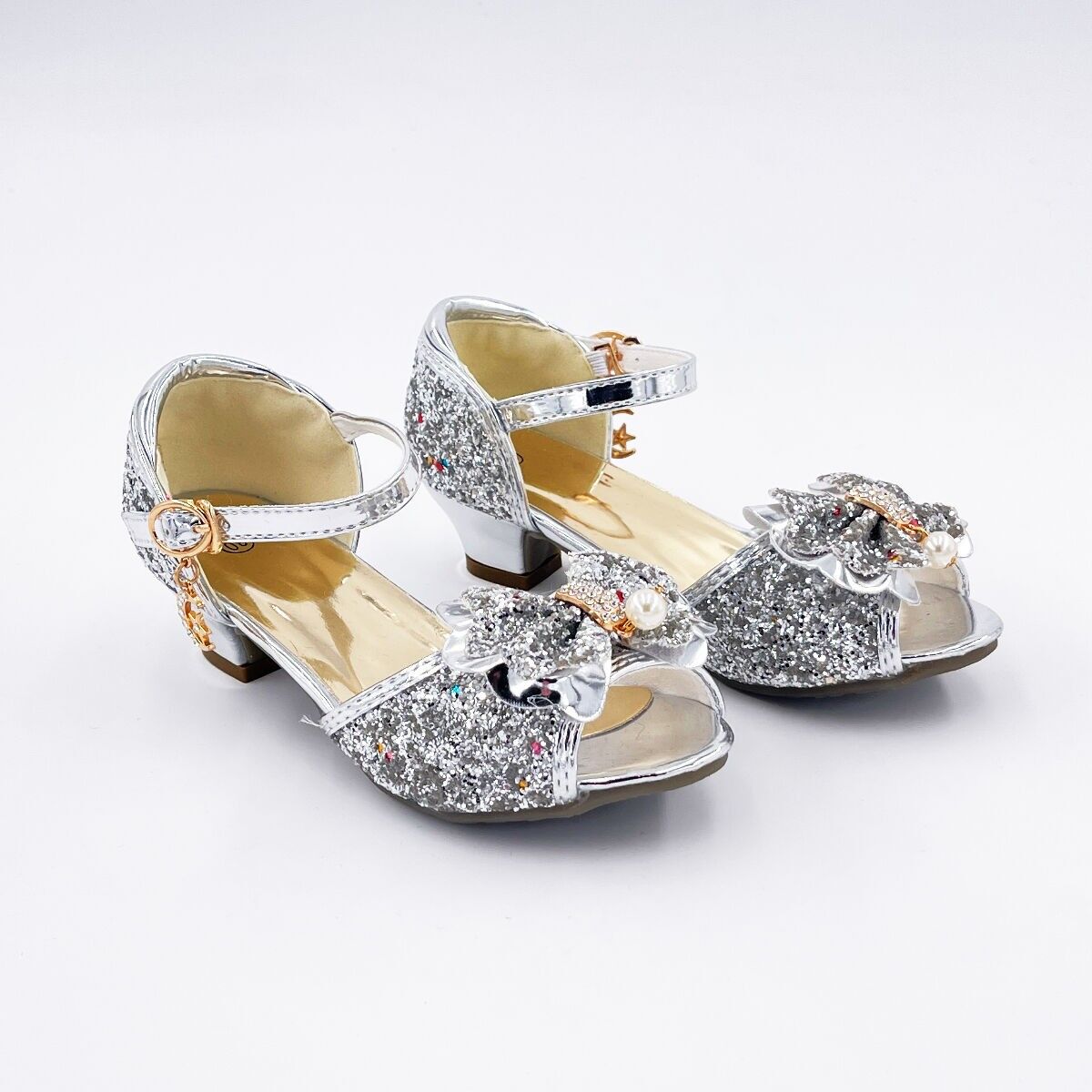 Mules con fiocco e paillettes argentate