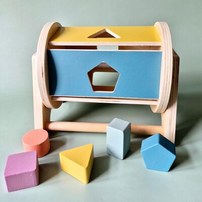 Clasificador de formas giratorio Montessori de madera: estimula el desarrollo motor.