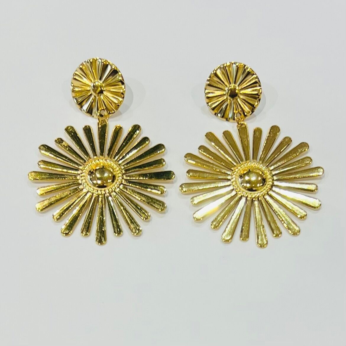 Orecchini pendenti in acciaio inossidabile con design solare