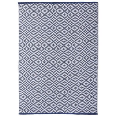 Alfombra Hug Rug tejida con rombos azul marino