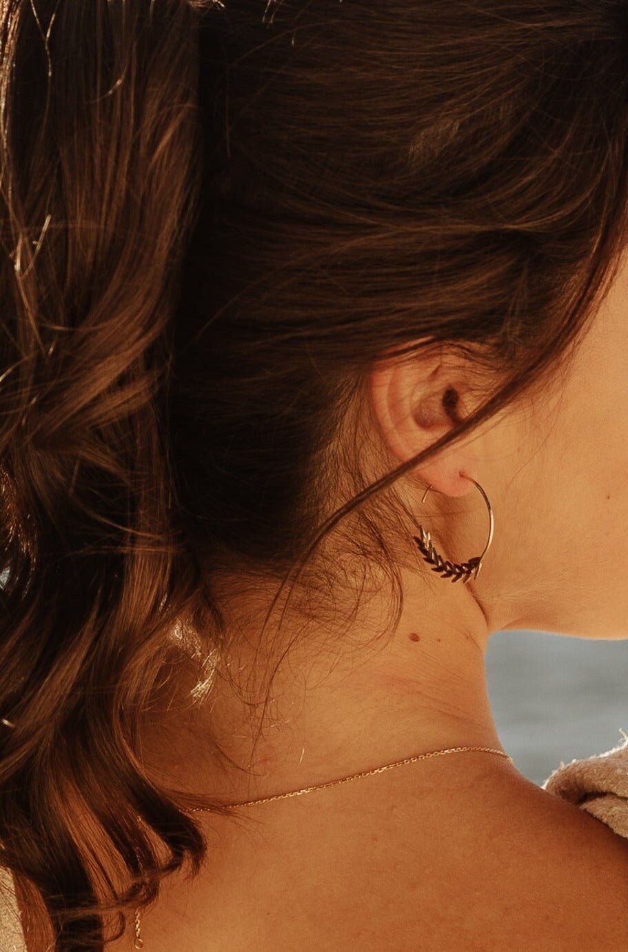 Goldene Ceres-Ohrringe