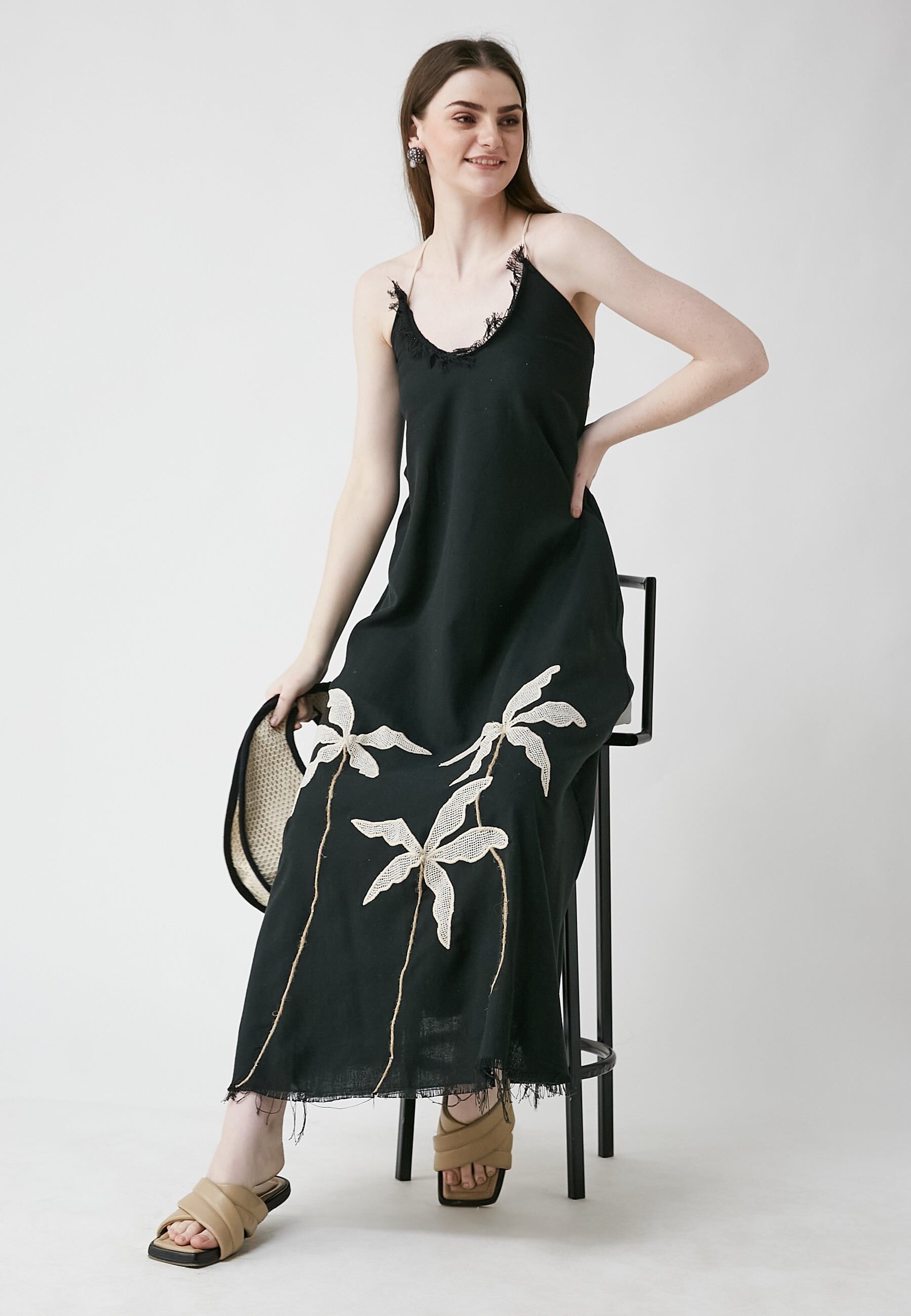 Abito lungo nero tropicale