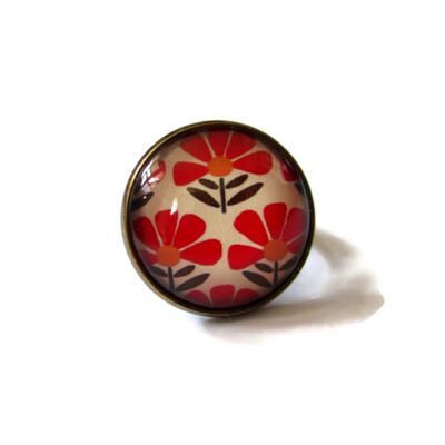 Anello retrò con fiore rosso su sfondo beige