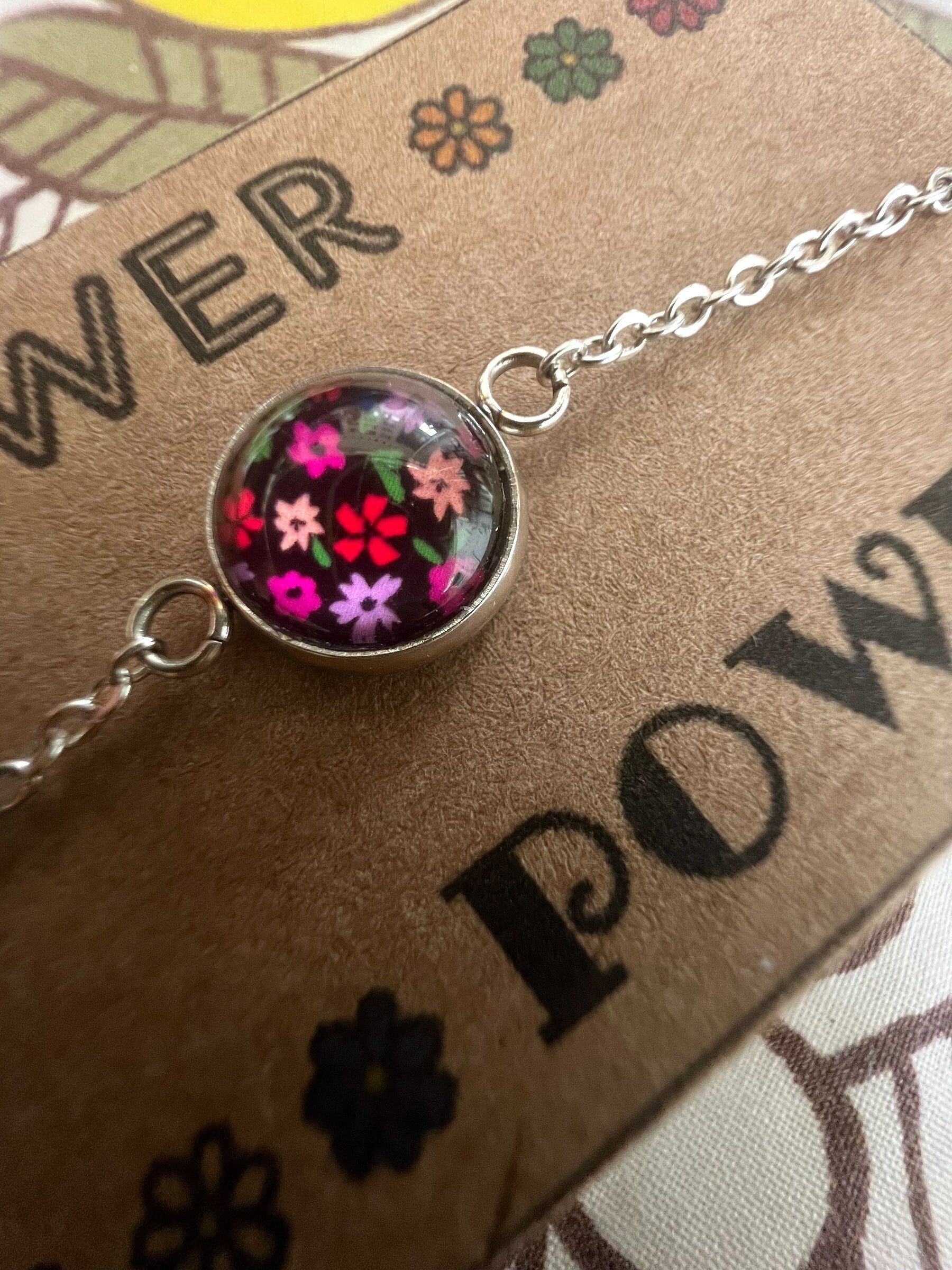 Stainless Steel Bracelet Pink and Red Flowers on a Black Background