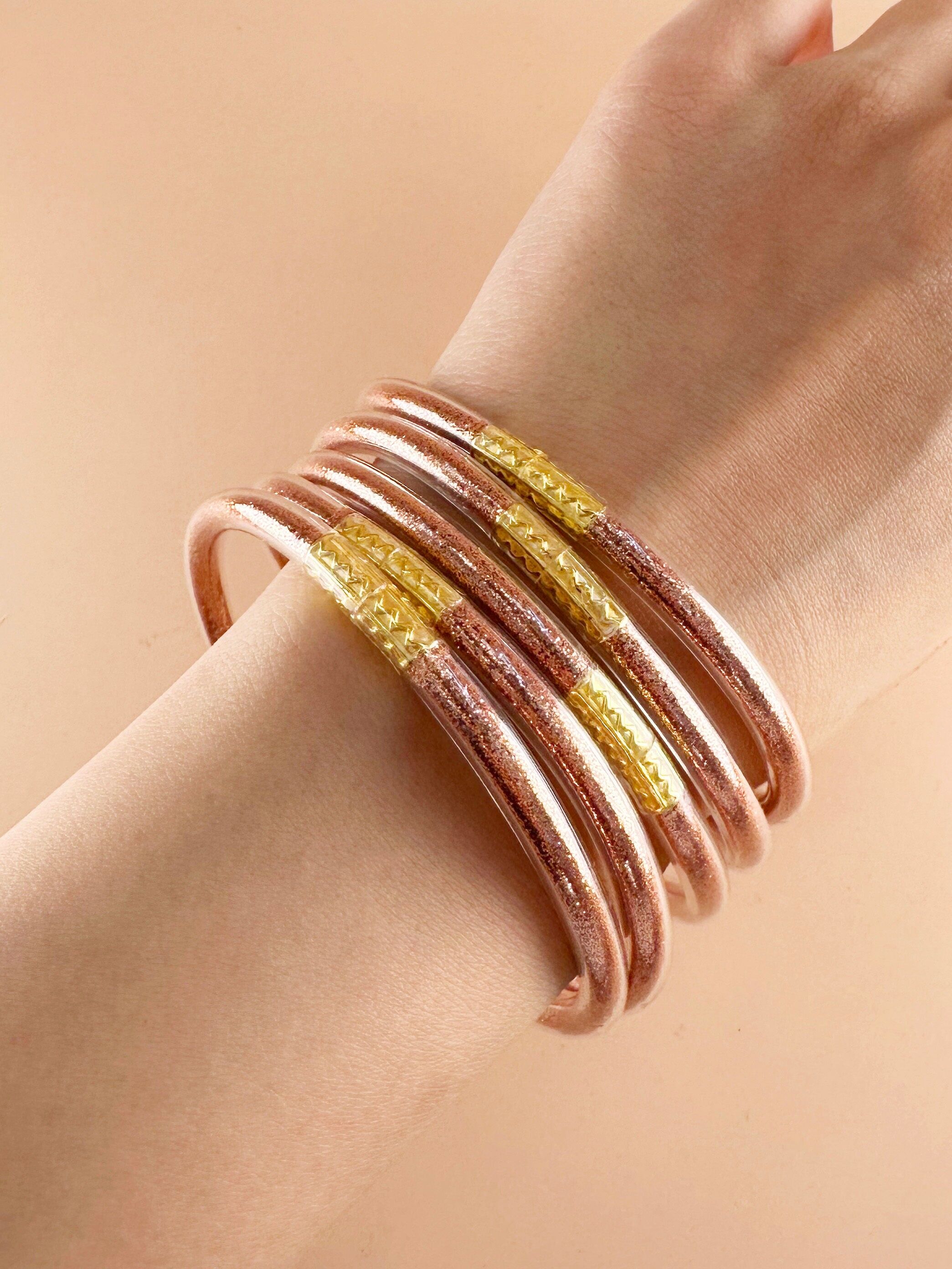 Bracciale buddista con paillettes di corallo