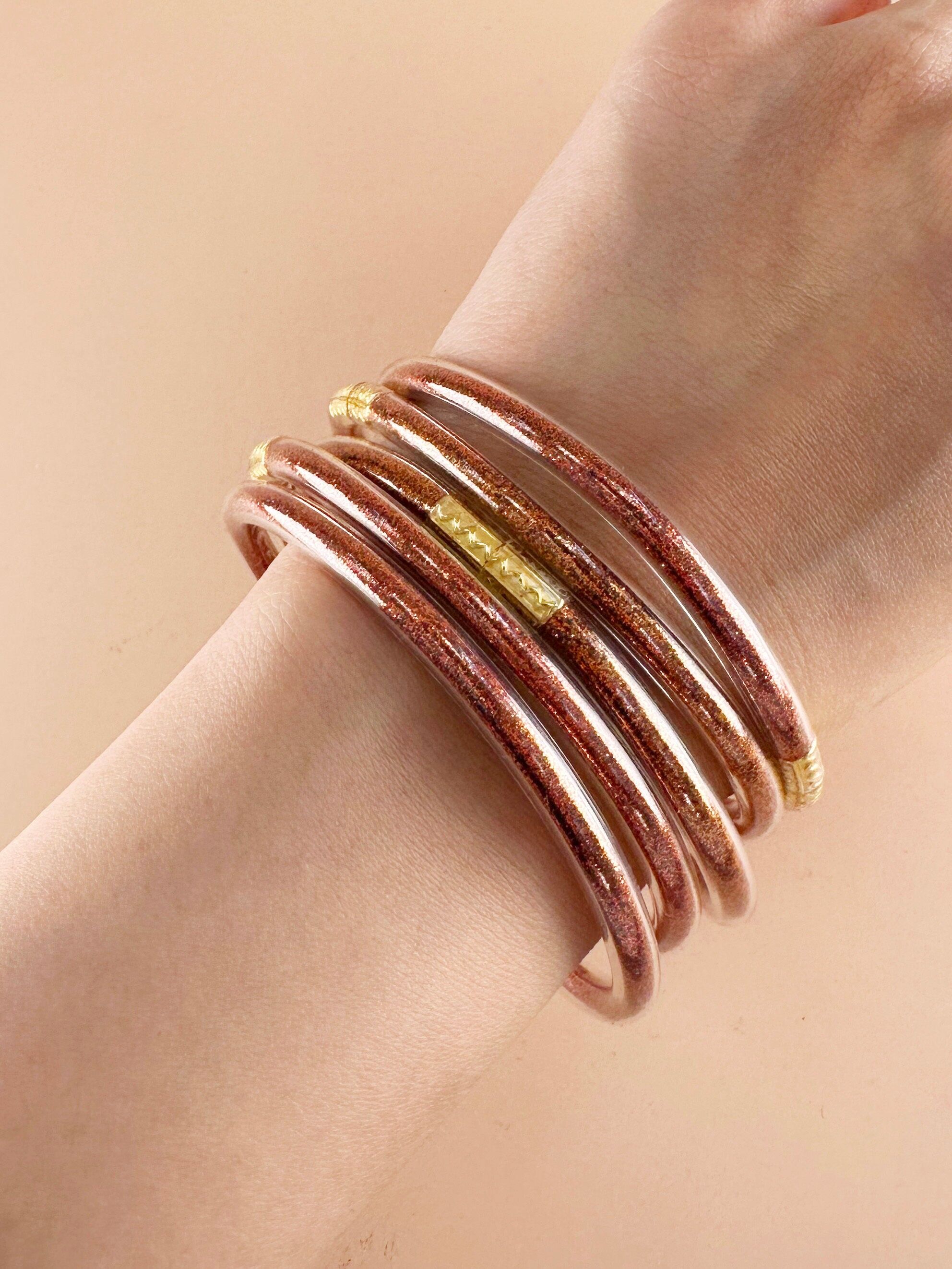 Bracciale buddista con paillettes rosso rame