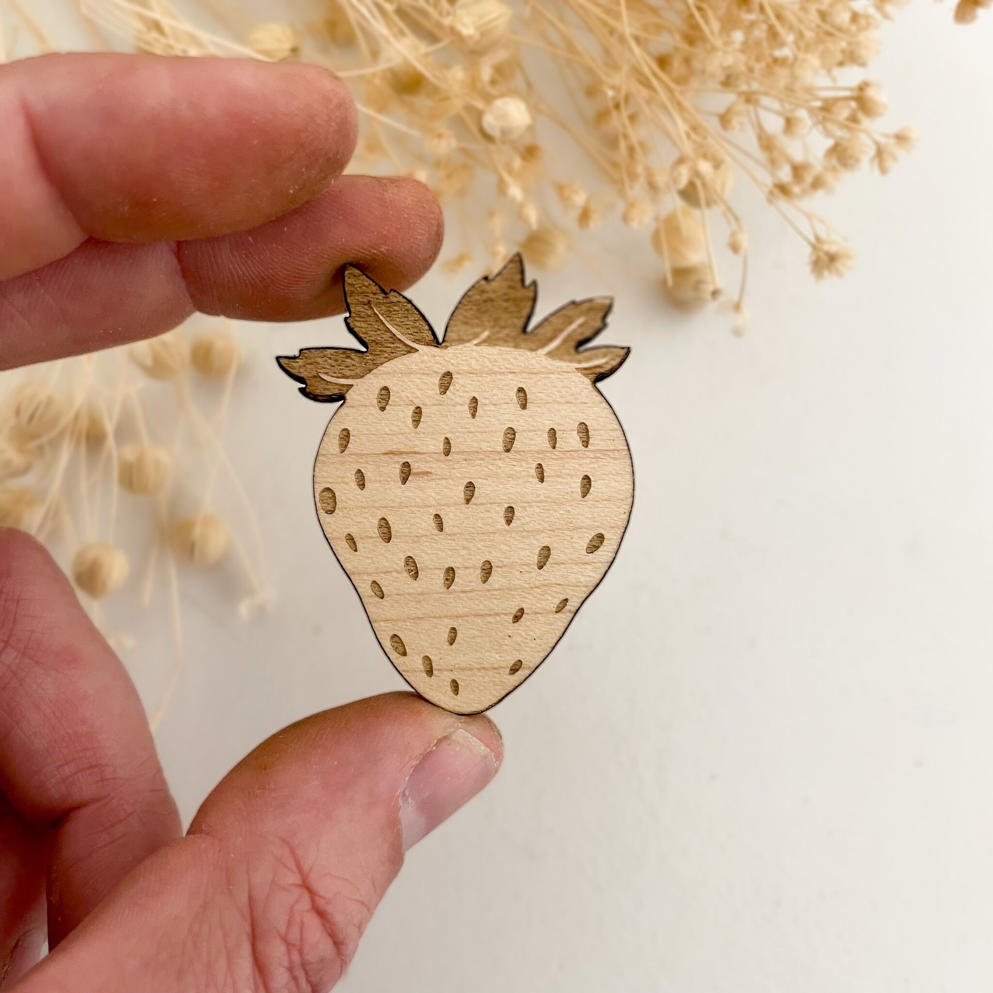 Imán de fresa de madera