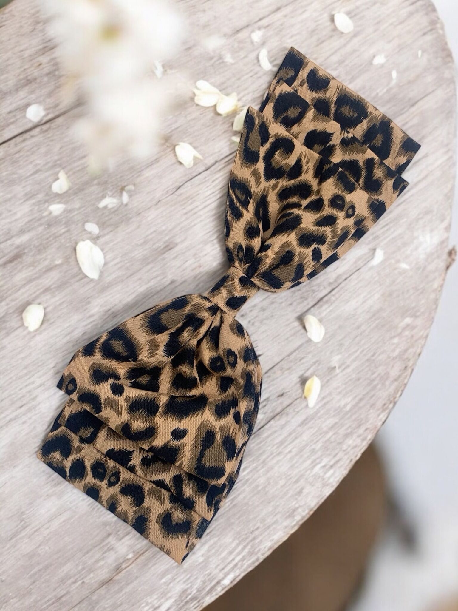 Fermacravatta a farfalla leopardato BRT02