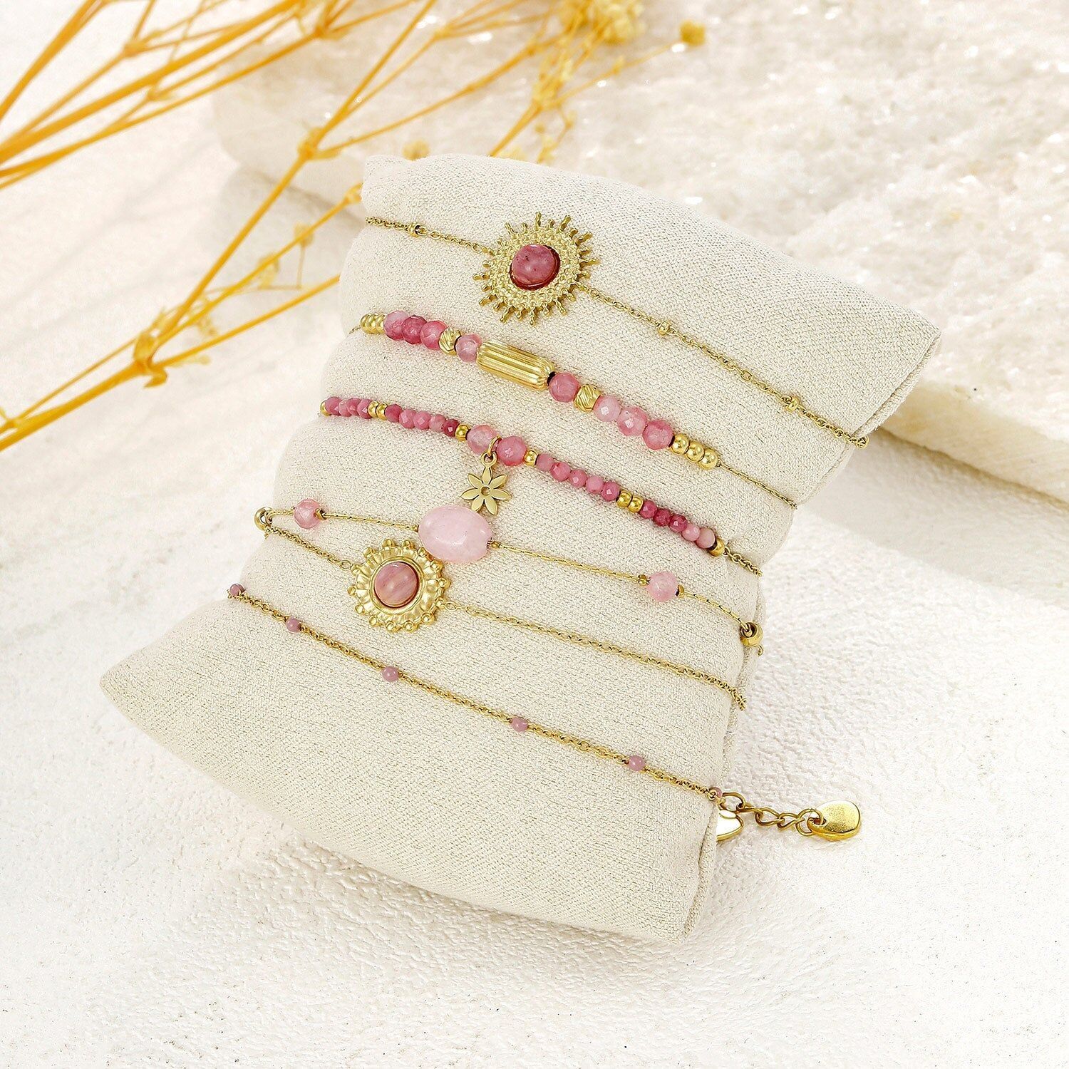 Set di 6 bracciali dorati con pietre di rodonite rosa