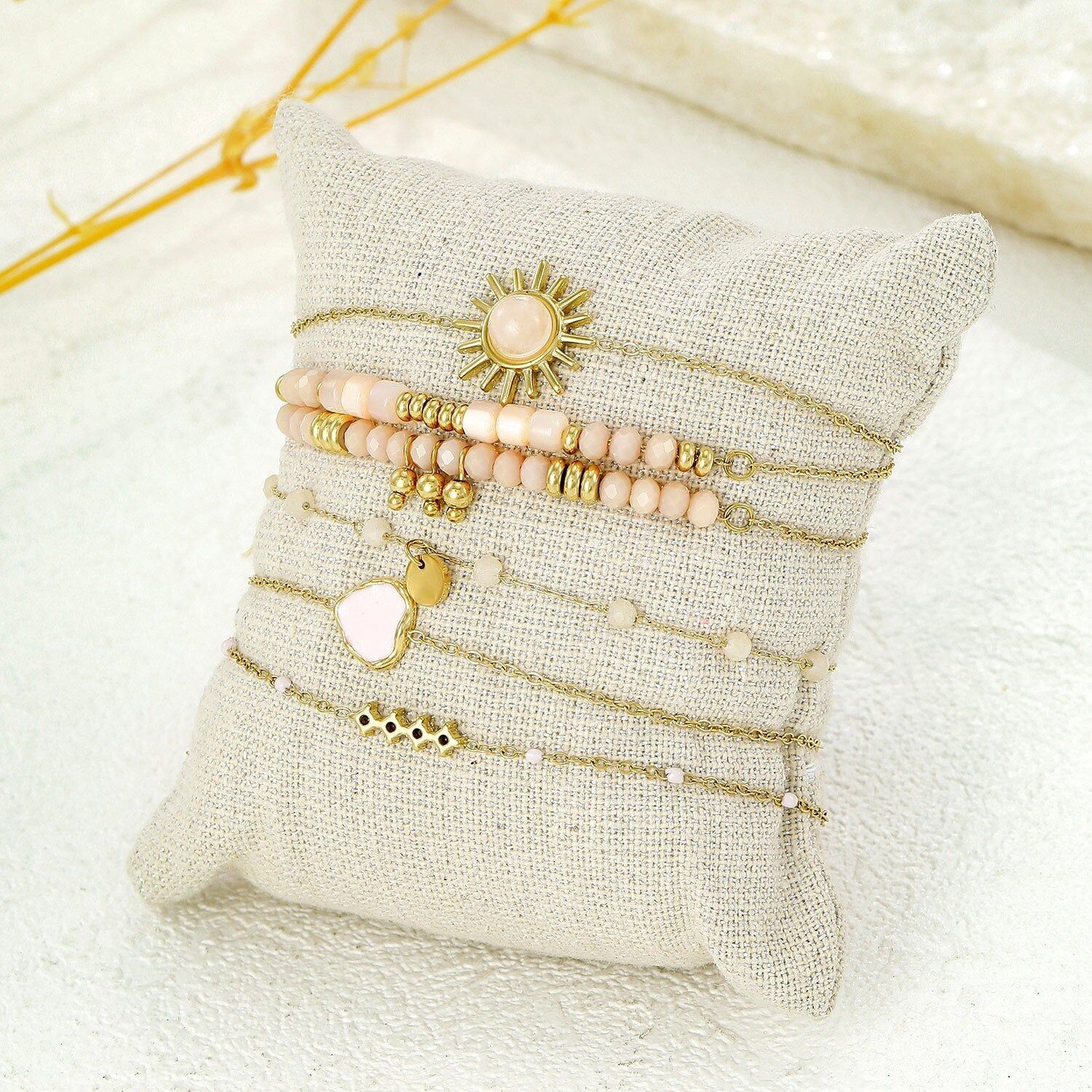 Set di 6 bracciali in oro con pietre rosa cipria