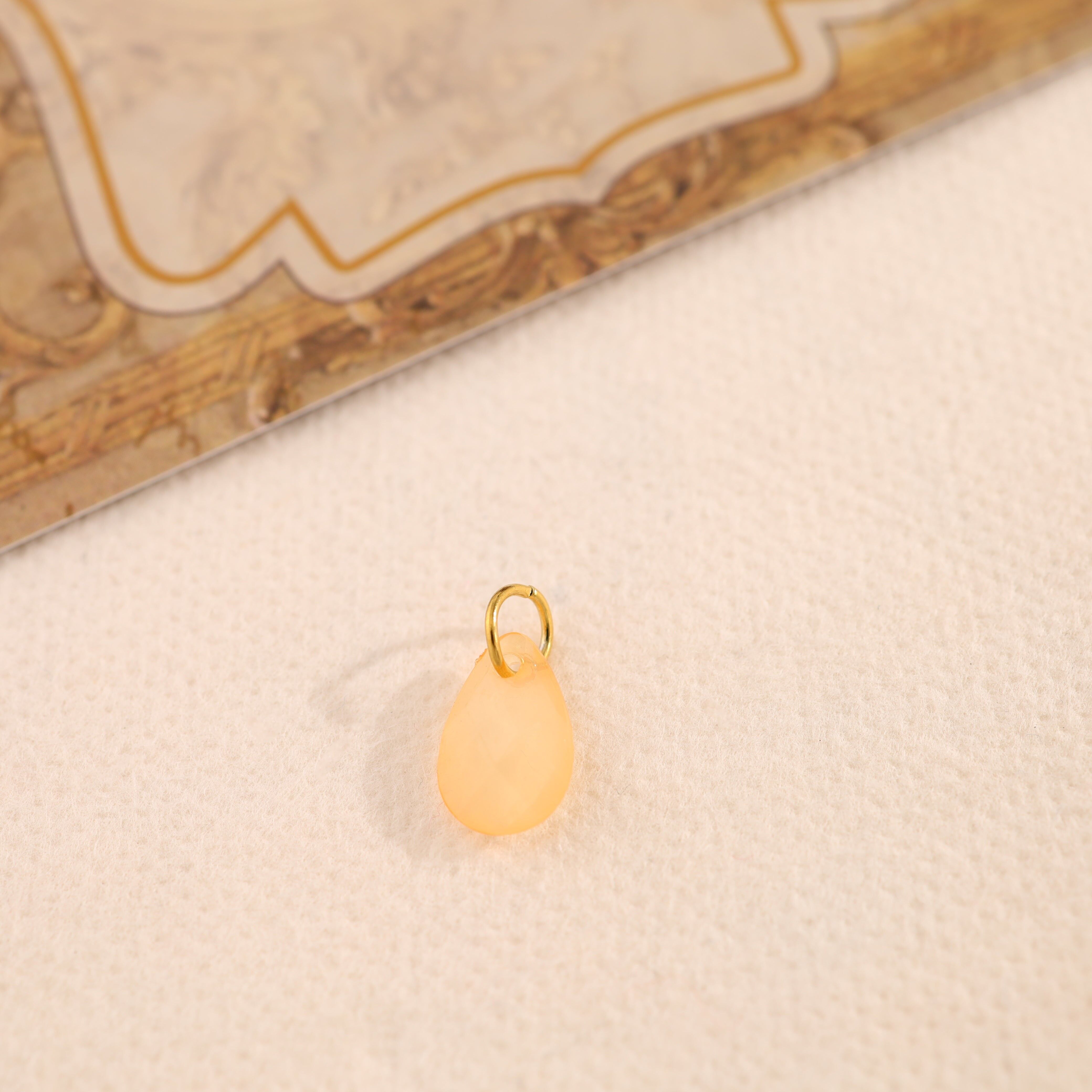 Set di 3 pendenti in resina color oro arancione pastello