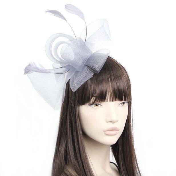 Stile Jackie.Fascinator a rete ad anello su un cerchietto