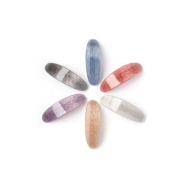 Ovale Haarspange mit metallischem Glitzer. 9 cm