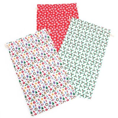 Dimensioni: 60x35 cm Confezione mista di sacchetti natalizi con coulisse