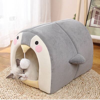 Casa cueva para mascotas con forma de pingüino