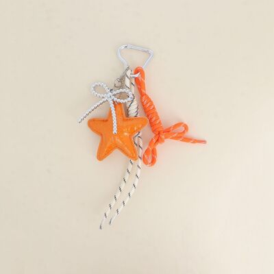Charm para bolso: pajarita, 2 cordones, bádminton y estrella de piel sintética.