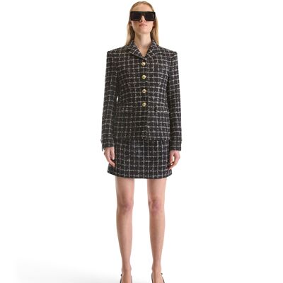 Falda corta de tweed a medida de Helen Anthony
