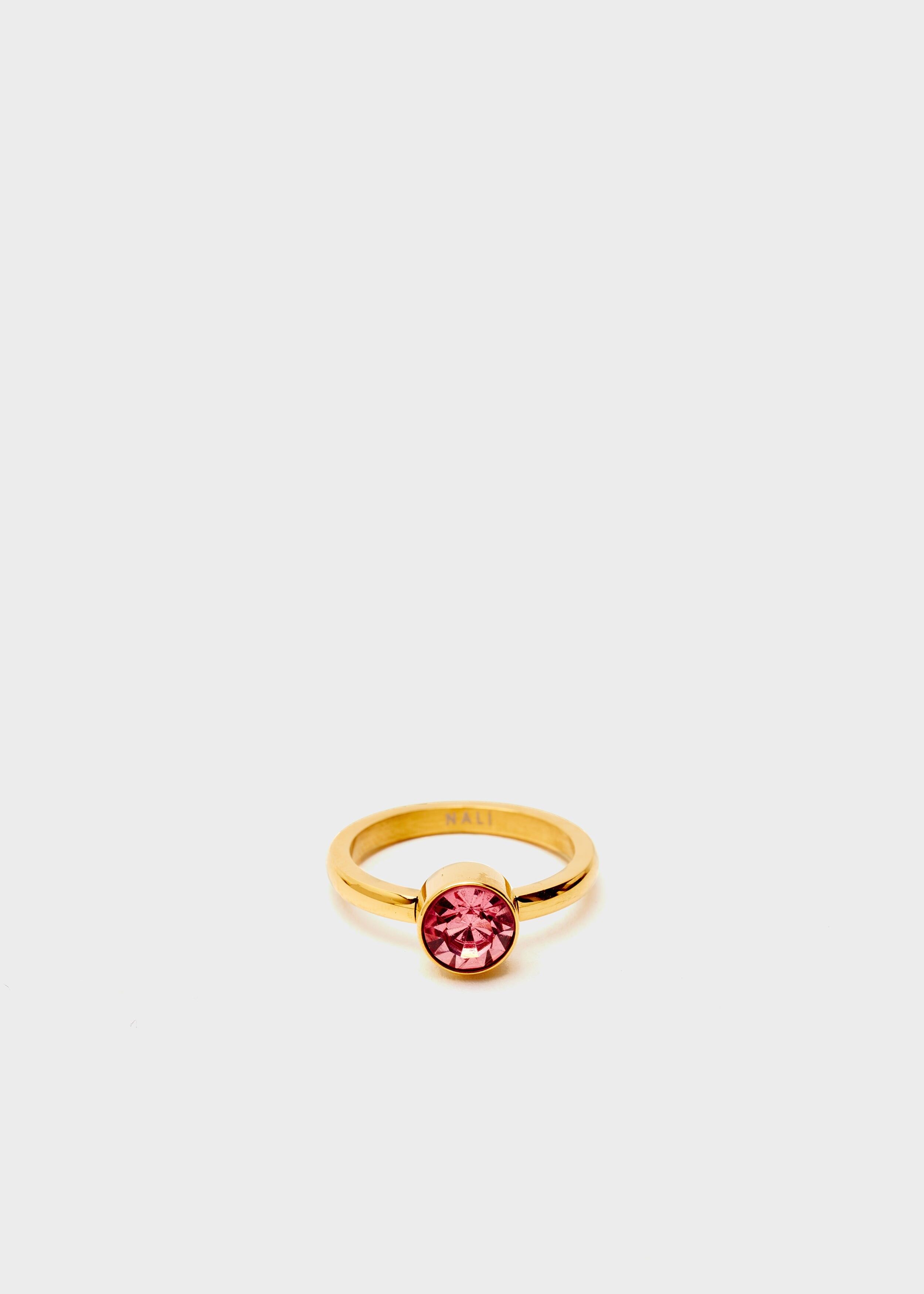 STAIN. STEEL FLORA THIN GOLD RING W/ PINK STONE