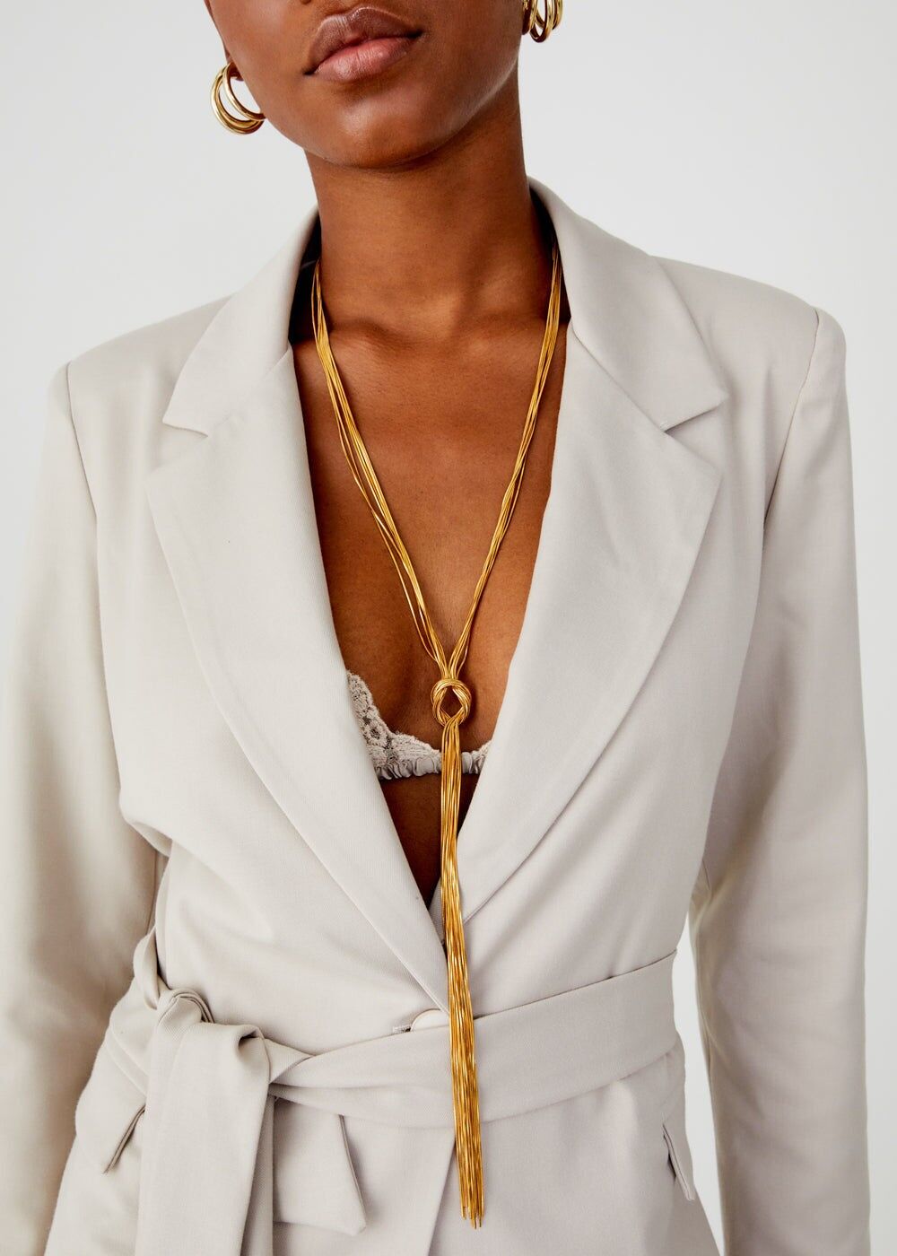 COLLAR LARGO TANIA ORO CON FLECOS MANCHA. ACERO