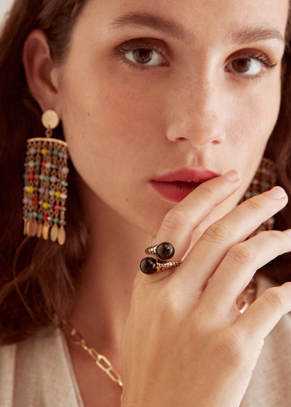 STAIN. STEEL RING WITH SILVER PEARLS