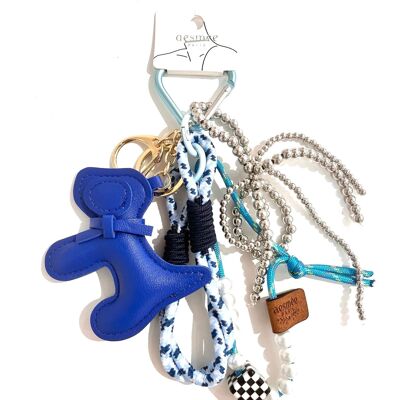 Portachiavi con ciondolo a forma di cane con perla blu, molto carino, per borse