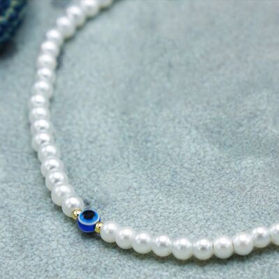 Collana di perle con occhio malvagio