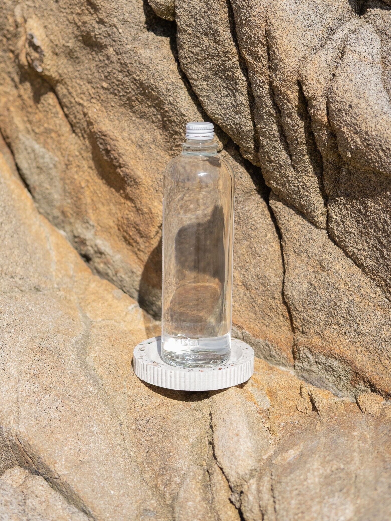 Bottle base made from recycled shells - COLOSSE